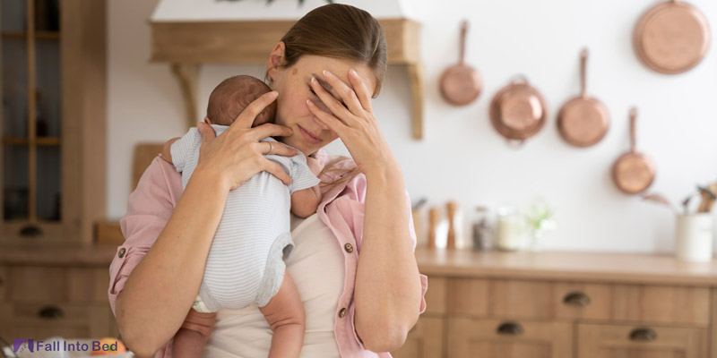 mother tired because baby only sleeps when held