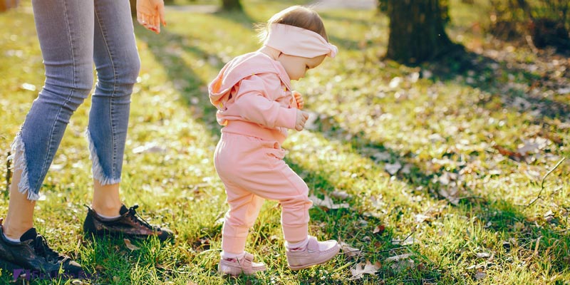 baby walking to prevent sleep regression